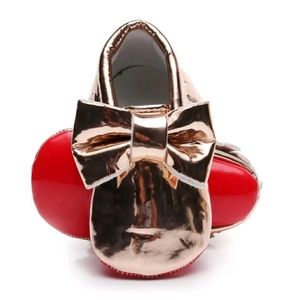 Kids red bottom moccasins